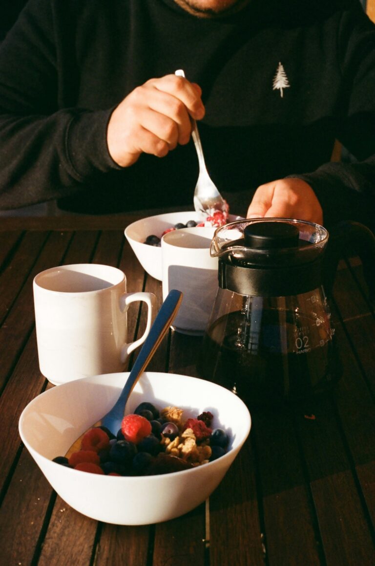 A person preparing a healthy breakfast as part of a daily routine.